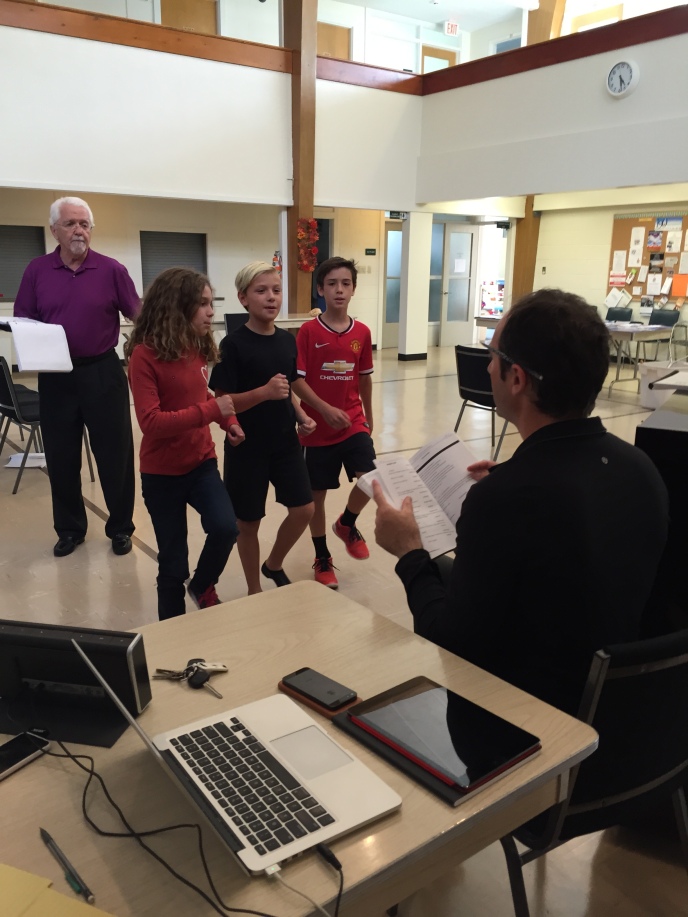 Co-Director Joel Varty works with the children's ensemble and Gary Potter (Toymaker)